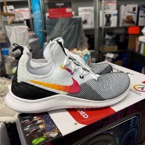 Nike Wmns Free TR 8 Laser 
Nike Kids' White and Black Athletic Shoe